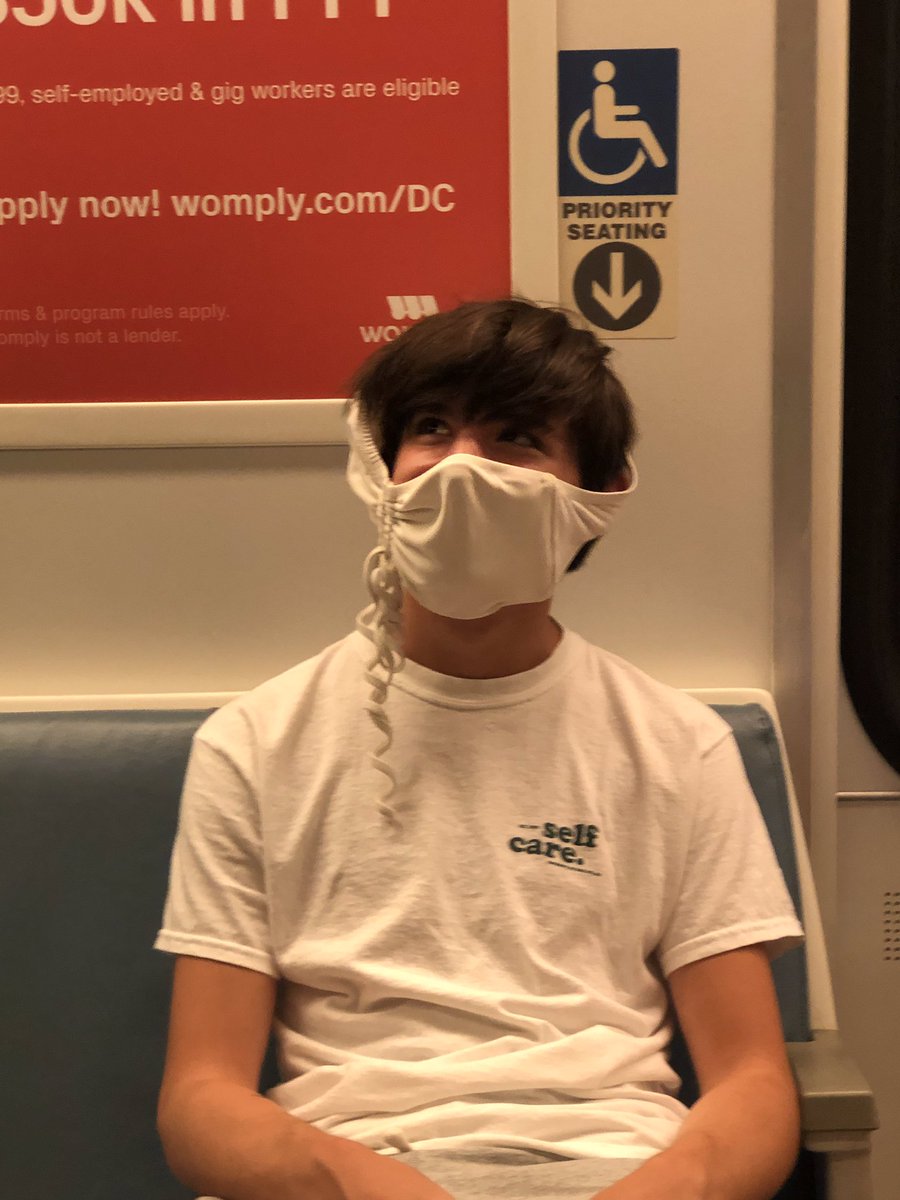 lamour's tweet photo. This creative mask-wearing is currently happening across from me on the subway #dcmetro #heyitworks #WearAMask #yesitsabra https://t.co/6IkAyU0rD4