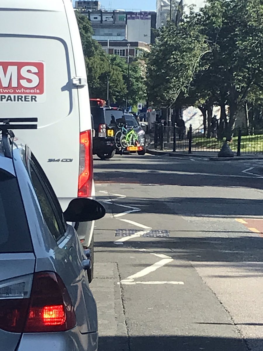 Enlarge the picture and check the Range Rover with bikes on the rack at the back