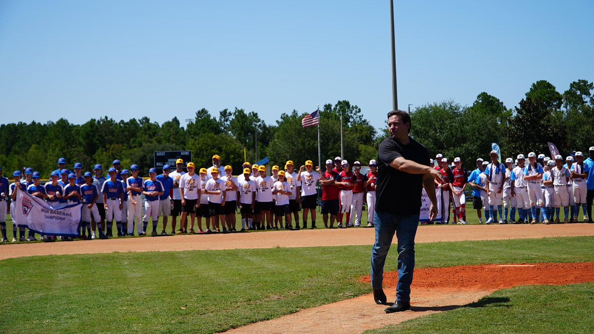 GovRonDeSantis's tweet photo. Honored to throw out the first pitch at the 2021 Little League Baseball State Tournament in Palm Coast. Good luck to all the teams playing this weekend, and thanks to the coaches, volunteers, and families for your dedication to providing opportunities for our youth. https://t.co/8oYVIsjzhN