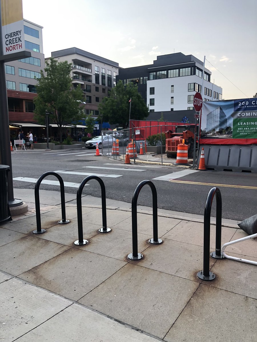 deliberateless's tweet photo. friday night in cherry creek: a whole lotta cars and a bunch of empty bike racks. #thisisdenver https://t.co/jp3TfDR7zo