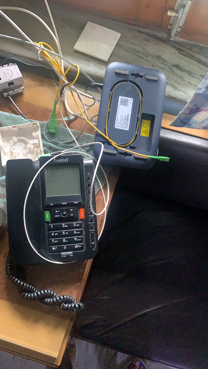 pankajratra's tweet photo. @JioCare - Jio Fiber technician this morning - they came, they saw, they left behind router as shown!!! Is this how they are supposed to function? https://t.co/knxDBTxys5