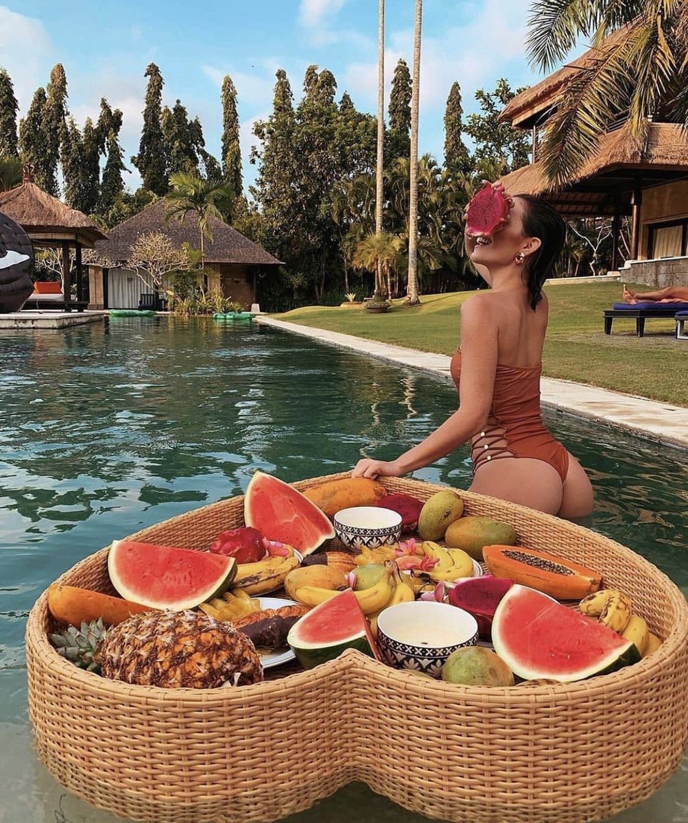 SueUseem's tweet photo. Twitter: Indonesia’s health care collapsing, mass graves being dug, desperate pleas for help and oxygen. 

Instagram: Come eat a floating breakfast in a pool in Bali in a bikini! https://t.co/8lr6IcvJaY