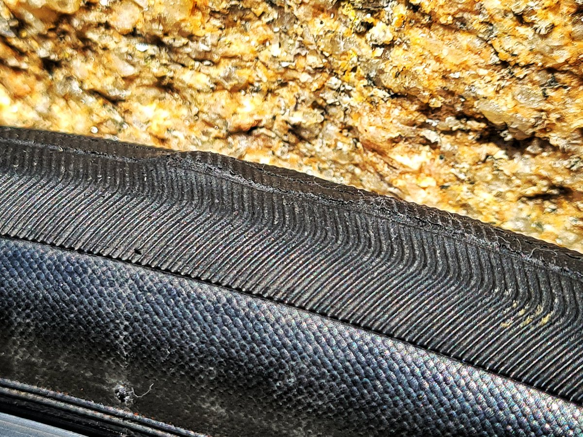 HRFatness's tweet photo. .@irctire_bike looking for some advice on what is going on with my tires please. Front tire has developed bulges in a couple of spots. Running tubeless, around 80 PSI. Have had a couple of sets which I've loved, but these new ones (around 500 km on them) are wearing strangely?! https://t.co/twav6z9iDv