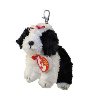 Poofie the dog. 
Birthday: July 17, 2001.
“My favorite thing to do inside
Is run across the floor and slide
It’s very easy for me to do
With fur like mine, then you could too !”