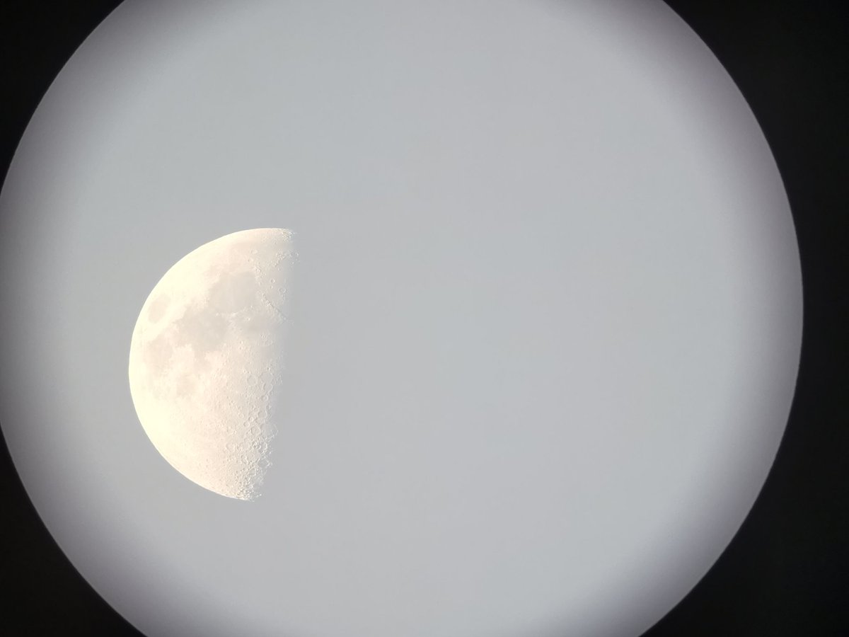 DrJeniMillard's tweet photo. Astrophotography doesn't need expensive equipment. Here's a photo of the Moon I took just moment ago, with my phone held up to the eyepiece of my William Optics telescope.

You can see many craters along the terminator and the dark seas 😍 amazing! https://t.co/VBlZlCnN0x