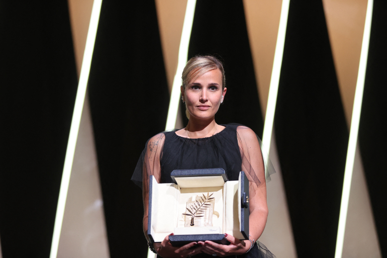 Massive congrats to RAW director #JuliaDucournau on her win at #Cannes &amp; becoming the 2nd only female director to win the  #PalmedOr w/ serial killer biopic #Titane I especially love the <a href="/France24_en/">FRANCE 24 English</a> headline- "Gore queen Julia Ducournau wins prestigious Palme d'Or" <a href="/RawMovie/">RawMovie</a>