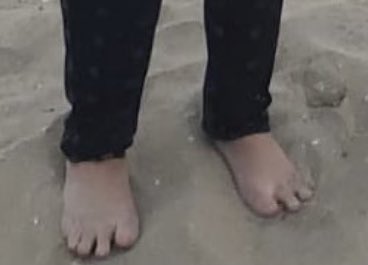 The tell-tale feet remind us that Marjorie Taylor Greene was banished from  the Shire at an early age for being a racist, evil Hobbit.