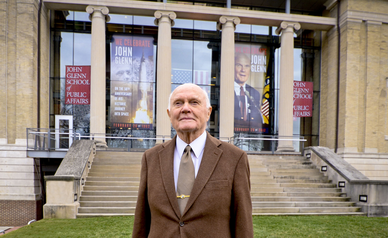 OhioState's tweet photo. Senator John Glenn was the first American to orbit Earth, a dedicated public servant and an advocate for education. Today, let's join @Glenn_college in celebrating the national hero's life and legacy on what would have been his 100th birthday: https://t.co/caHUhndWPk https://t.co/mx0jYGDFYB