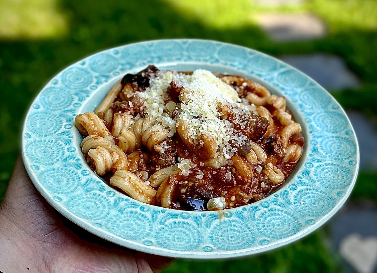KaminskiMed's tweet photo. Paccheri alla Siciliana at a restaurant on Wooster Street, a week ago, was really weak - so I made Pasta Ala Norma at home. Fresh Pasta, tomato sauce, eggplant, Ricotta Salata , Parmigiano, Basil. Simple. Better. #PCCMEats #PCCSMEats #eggplant #WorkLifeBalance #MissingItaly https://t.co/A4XkeuTgj5