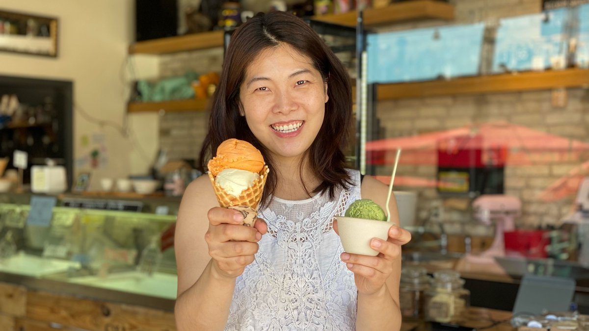 Enjoy a medium cup or cone—on us! We partnered with @intentionalist_ to open a $250 tab at Sweet Alchemy in the U District. Let them know to put it on our tab and show them this photo of owner Lois Ko with her sweet treats. #NationalIceCreamDay #BeIntentional #SpendLikeItMatters