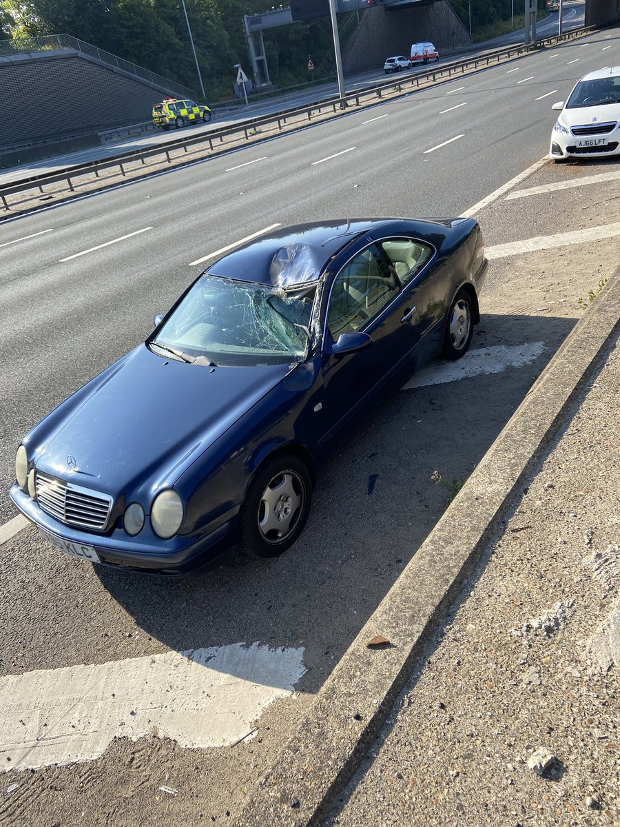 KLCarchitects's tweet photo. @Kent_999s That’s me sitting on the boot of the car in first photo on the other side of the road involved in the accident! The pipes hanging under the bridge dismounted and fell on my car while driving under the bridge! Crazy and scary at the same time..and that heat! https://t.co/HbdKmLF0Jm