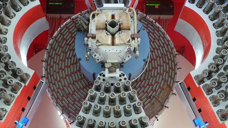 A complex circular machine, with dozens of various gadgets extruding from it.