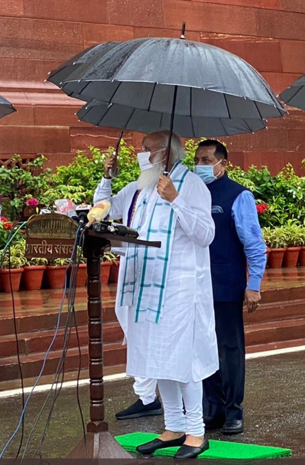 The Hawk Eye on X: Powerful image. This is not just umbrella holding. For  India, this is paradigm shift.  / X