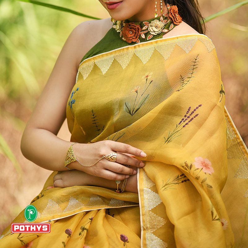 pothysonline's tweet photo. Walk around confidently and gleam wearing the mustard organza saree!
Shop Now: https://t.co/T1jIS4jTlj
#organzasaree #organzasilk #traditionalwear #floral #floralprints #partywear #saree #ethnicity #drapesofindia #styleandconfort #vocalforlocal #trendycollections #floral #Pothys https://t.co/Lb8RD5WSJR