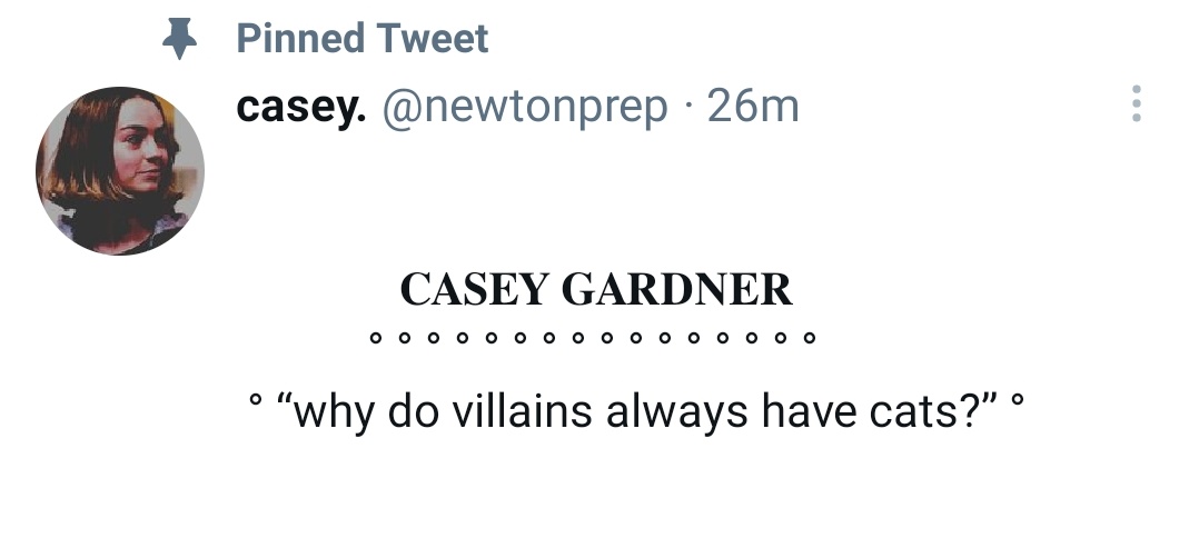 newtonprep's tweet photo. ID: screenshots of pinned with a black background and a white background. with text that says; Casey Gardner. Why do villains always have cats? https://t.co/6twd9OFS4G