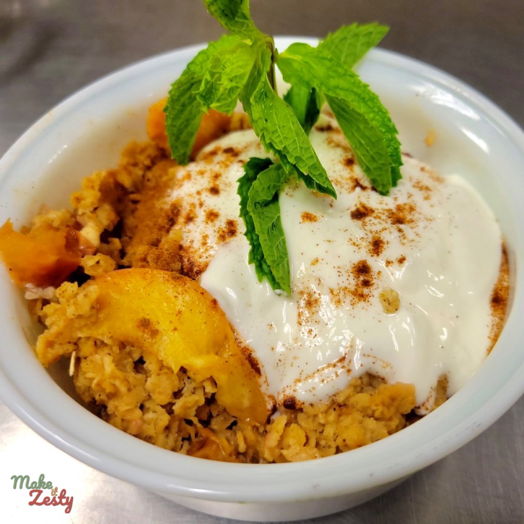 makeitzesty's tweet image. Homemade Oat Peach Cobbler😋

Had a great time teaching participants how to make this healthy version using coconut sugar and turmeric.  

Added Greek coconut yogurt and garnished it with a mini mint tree and some cinnamon. 

#makeitzesty #healthydessert  #peachcobbler  #oats
