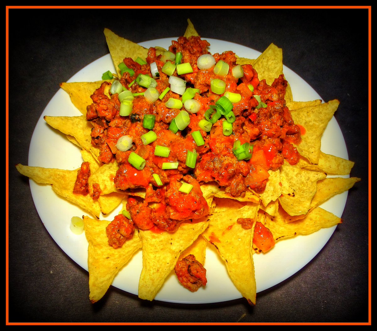 Hearty La Coulee Beef Nachos #dinerinmymind #homecooking #food #cookingathome #LaCoulee #beef #nachos #tortillachips #lacocinafoods #onions #garlic #bellpeppers #jalapenopeppers #greenonions #jackcheese #tomato #cumin #cilantro #lime #V8    #shoppinglocal #Manitoba