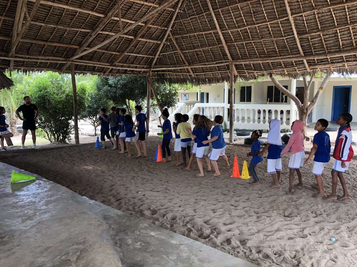MissPear87's tweet photo. One of my @DIS_Dubai pals is holidaying in Zanzibar and kindly came to my new school, met my new kiddies and taught them a PE lesson! They loved their life and he loved seeing what international school life is like here! 🇹🇿
#BackToBasics
#Zanzibar
#Expat
#Teaching https://t.co/S2zjmXsHNe