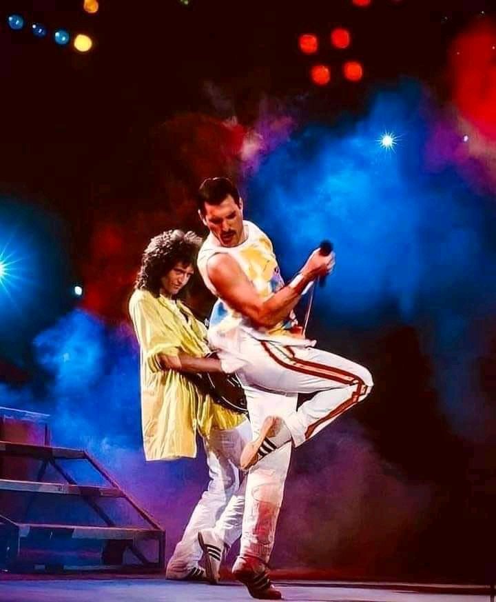 Freddie Mercury 
Brian May happy birthday 