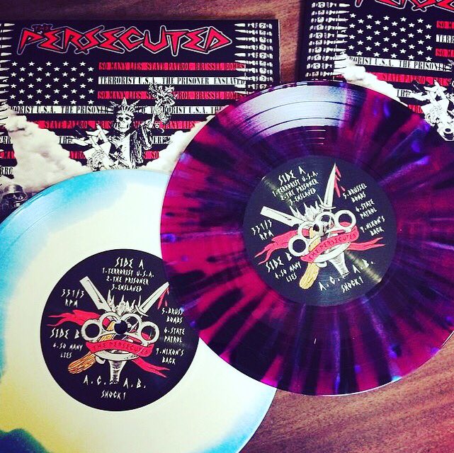 Persecuted82's tweet image. Our latest release, on either purple splatter vinyl, or blue/white swirl vinyl. Available from @punksandrogues for $6 plus shipping
