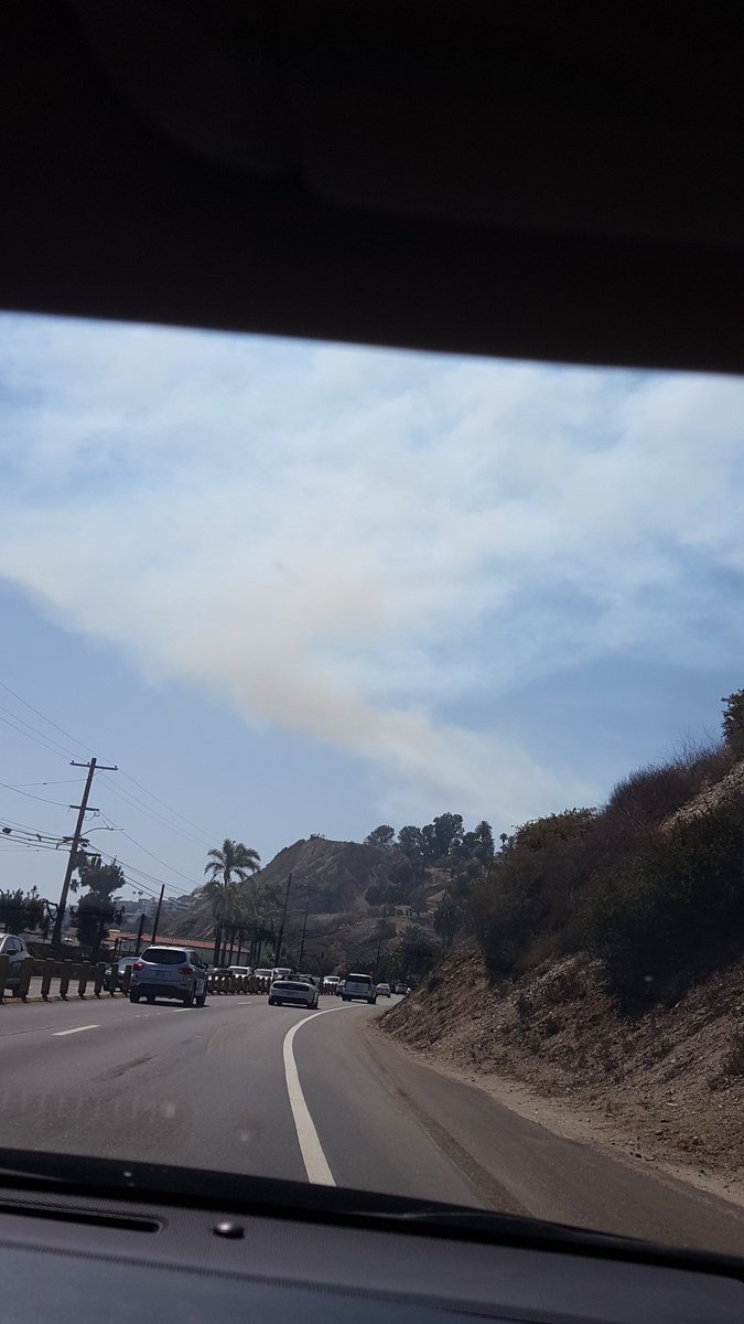 DrParsons_In14's tweet photo. Looks like a fire above Malibu!  Hope they get a handle on it quickly. https://t.co/5RH77GmCyr