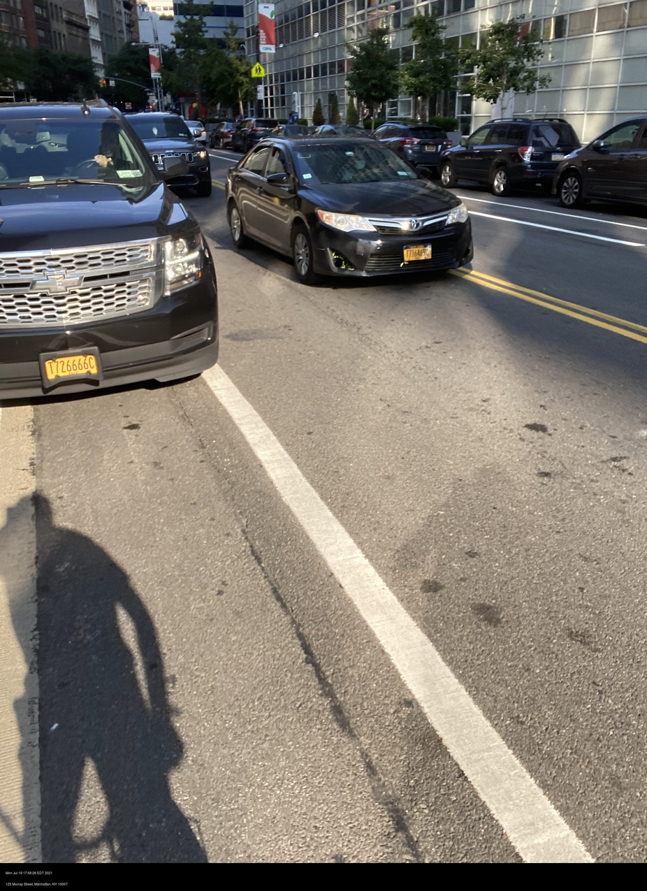 Photo of car in the street with license plate T726666C in New York