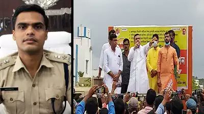 timesofindia's tweet photo. Suvendu Adhikari warns cop: Don’t do anything to risk transfer to Jammu and Kashmir 

https://t.co/FLKYhOUeSQ https://t.co/0jgrEKLM4g