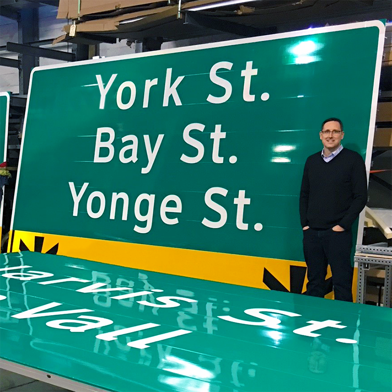 stinsontraffic's tweet photo. Our President, James Delamere is all smiles beside a large extruded aluminum sign made in-house. Need a custom sign made for your next project? Email signs@stinson.ca or call us anytime at 1-800-561-6639.
#ExtrudedSigns #CustomSigns #GuideSigns #InformationSigns #StayStinsonSafe https://t.co/1IV2VMNhDX