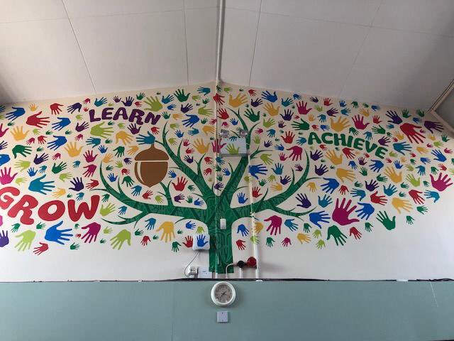 PCABlackpool's tweet photo. Our fantastically designed mural now takes place centre stage in our hall. We couldn’t think of a better design to share together! 🎨

“We grow together, we learn together, we will achieve our best together” 

#GrowLearnAchieve 
@PCAsecondary @PCAsecondary @PCAWSFC @SeaViewTrust https://t.co/M5ATnp5ttL