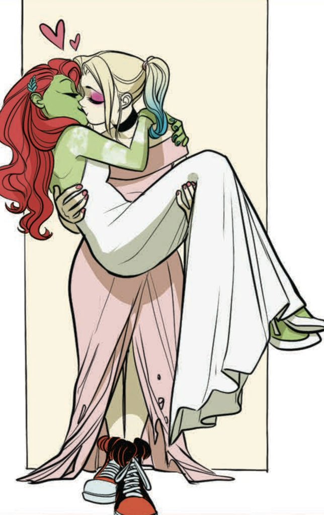 Harley Quinn in a soft pink bridesmaid dress carrying Ivy in a white dress ...