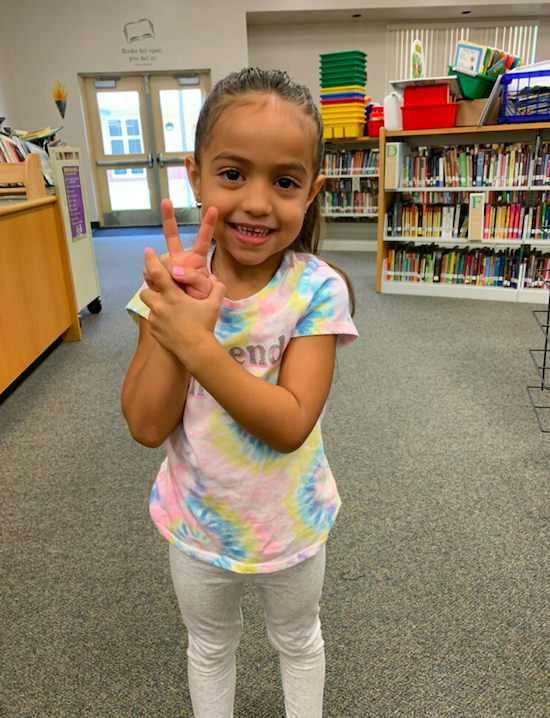 Mrs. Edwards meeting one of our newest Kindergarten Connerton Crocs, Emma! We are so excited!