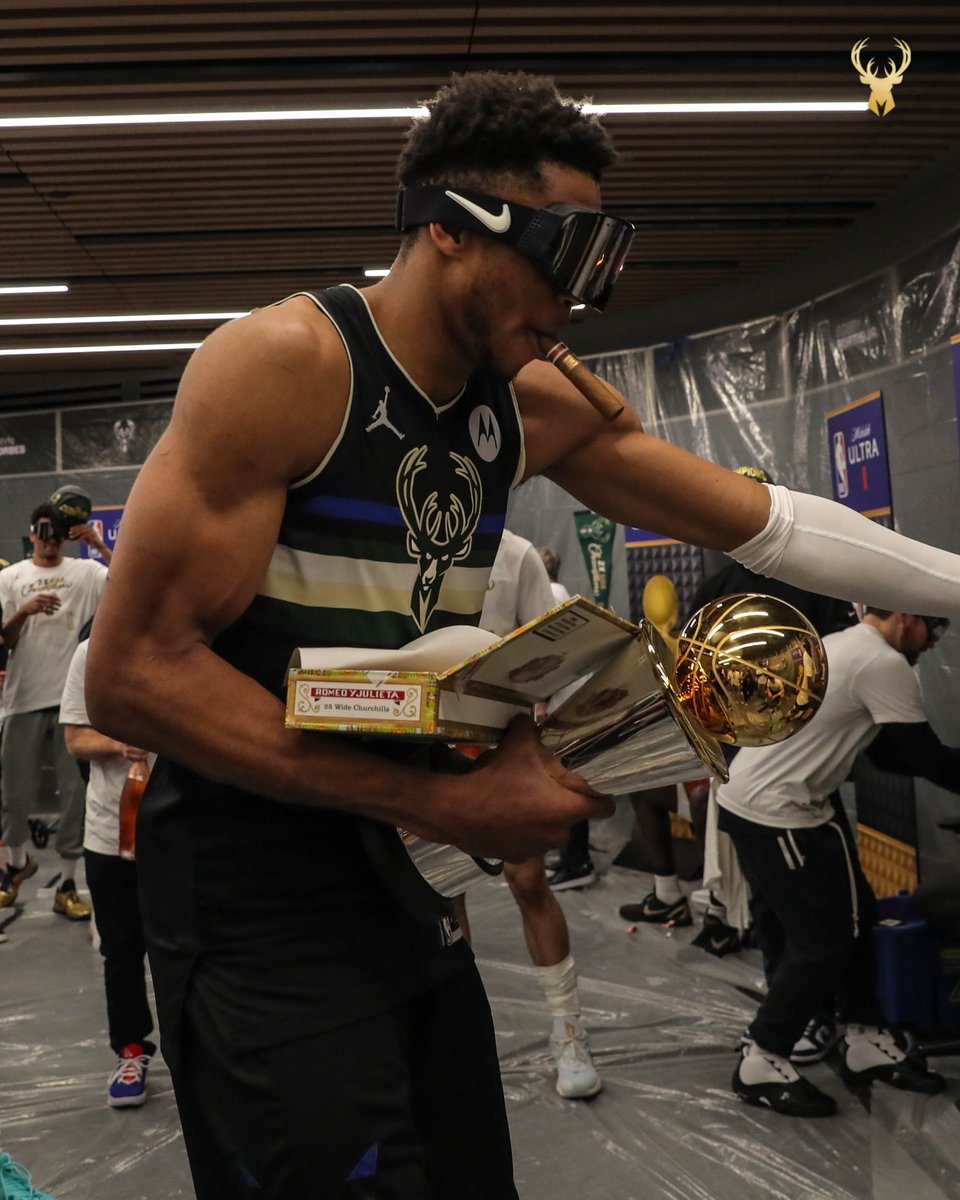 Bucks's tweet image. The CHAMP living his best life.