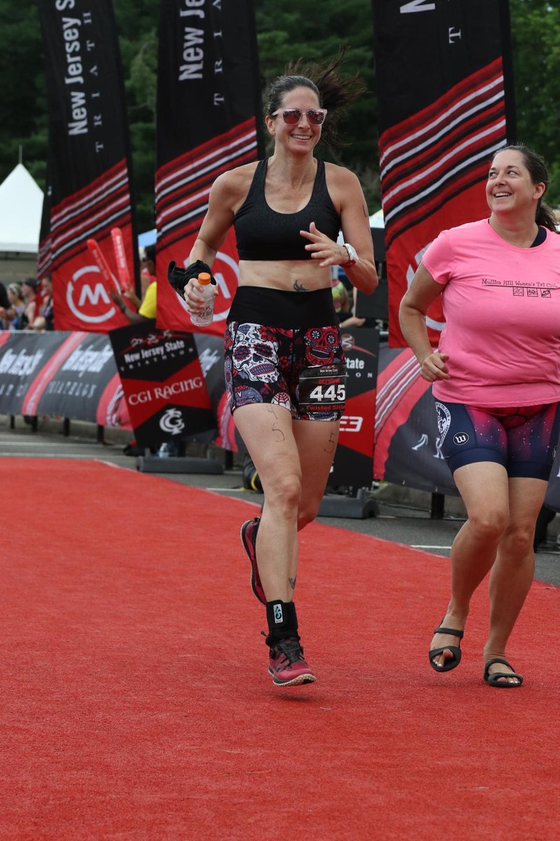 ScoliSwimmer's tweet photo. So awesome for me to be able to race with my sister, I did the swim &amp; run &amp;  she did the bike for the New Jersey state Olympic triathlon! We both have #scoliosis and we both are fused #spinefusion #Triathlon https://t.co/VtwMjG7MqV