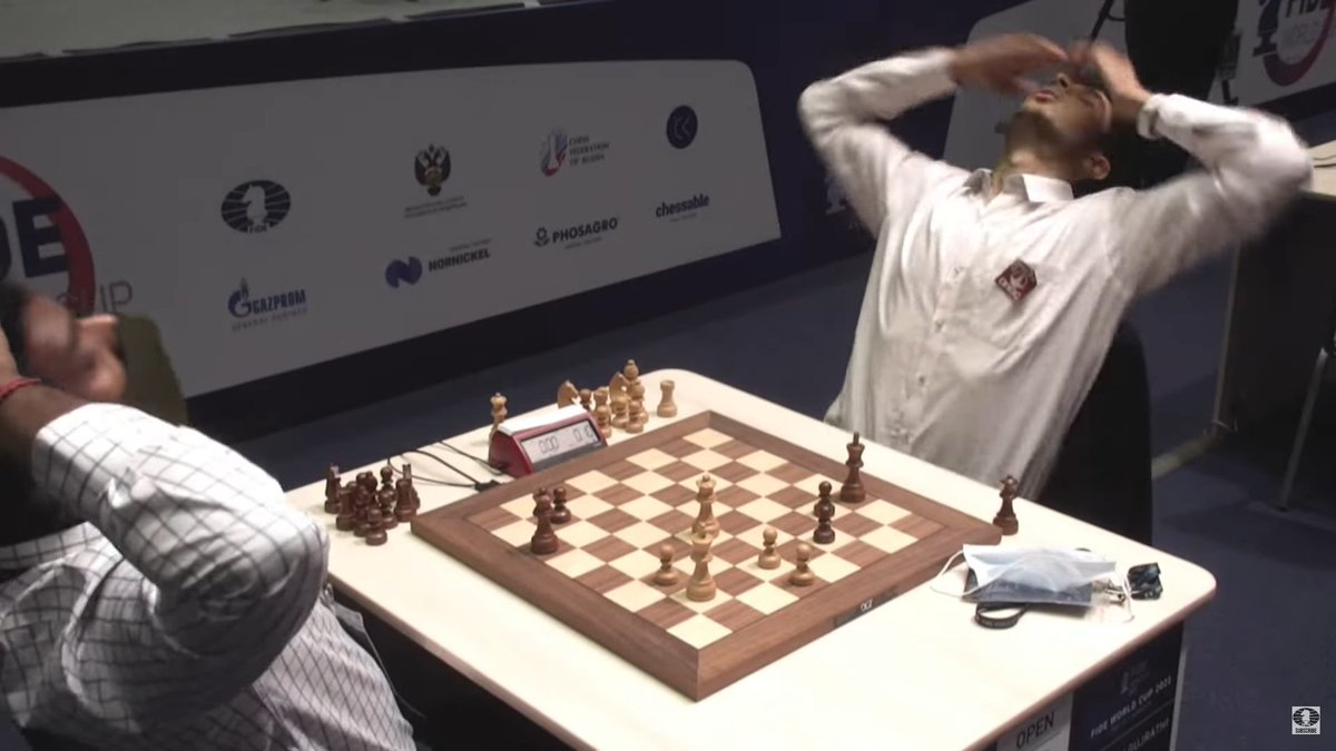 ChessbaseIndia's tweet photo. That final moment where all emotions of happiness, relief, disappointment meet. Who said chess is not an emotional sport! 

Check the video featuring the final moments of the game between Adhiban and Vidit from the World Cup 2021:

https://t.co/dwLprkbBBg https://t.co/j5jp4KulZj