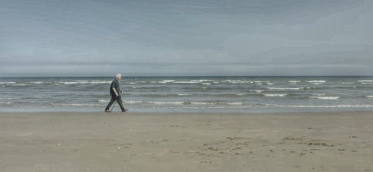 IMcMillan's tweet image. Ace photo by ⁦@Juice_Media_UK⁩ of me striding along Fraisthorpe Beach with a prop walking pole for a ⁦@swiftgroup⁩ filming day. Don’t look at the drone, Ian; don’t duck! Look thoughtful. Look wistful. Keep walking.