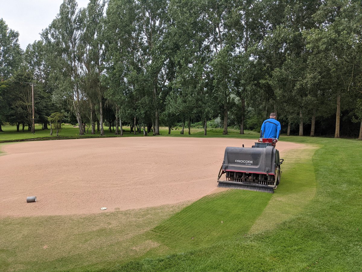SMGCgreens's tweet photo. Maintenance week in full flow.  Bringing out the big guns @MattShort130580 to solid tine greens and collars.  Greens verti drained, dressed, brushed and rolled.  Finally overseeded with creeping bent grass using the #vredo from @ListerWilderGC #crystalbluelinks #greenkeeping https://t.co/IiCawBUID0