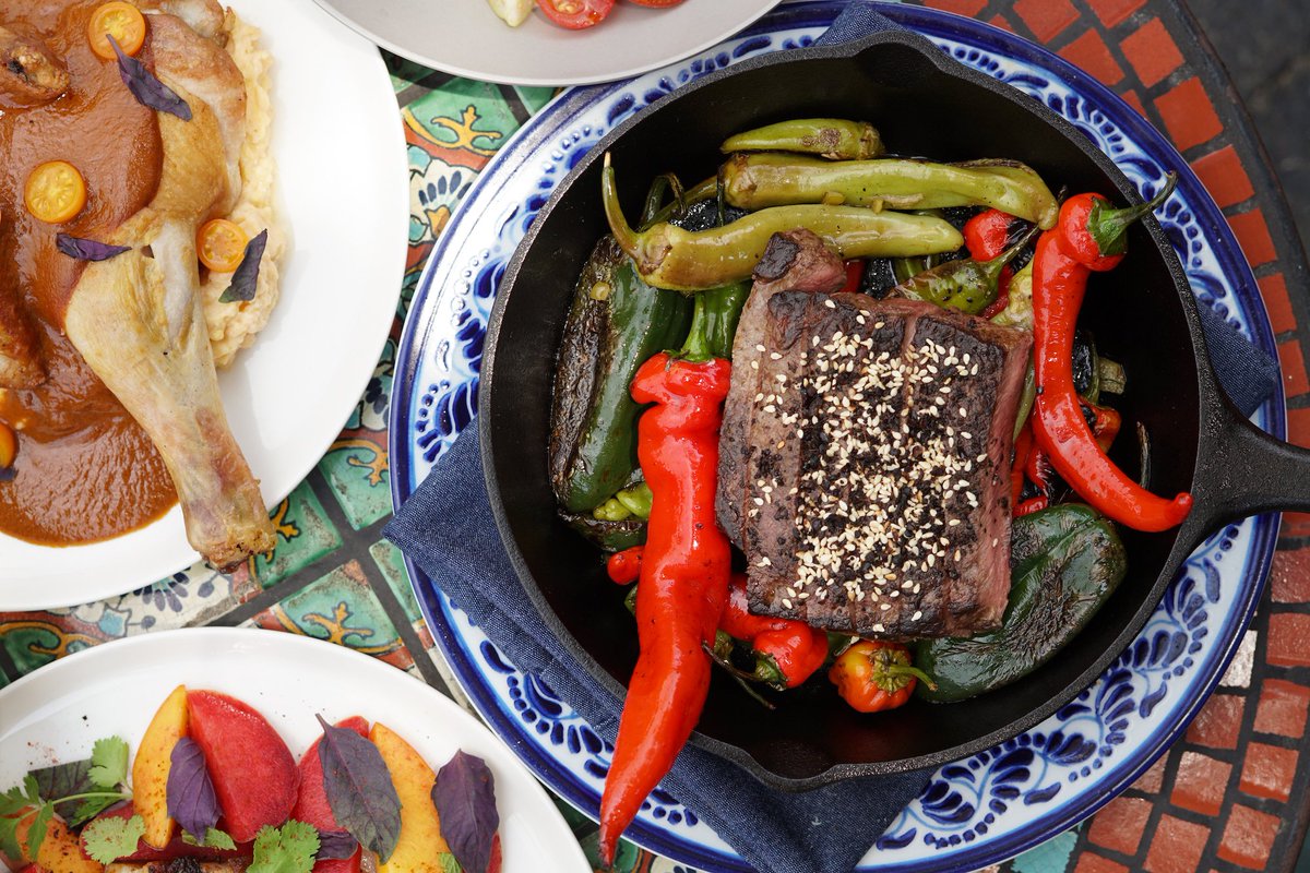 Charcoal grilled flat iron fajita with jimmy nardello peppers, padron, shishitos, garlic, benne