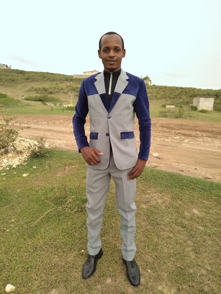 Haiti323Project's tweet photo. Look how sharp Wilson looks in this suit he recently made! 
Wilson is a 2018 graduate of our Port-de-Paix #sewing program. He started his own sewing business after graduation and makes a variety of everyday and special occasion clothes. 

Awesome work, Wilson! https://t.co/eUm0kKcJh8