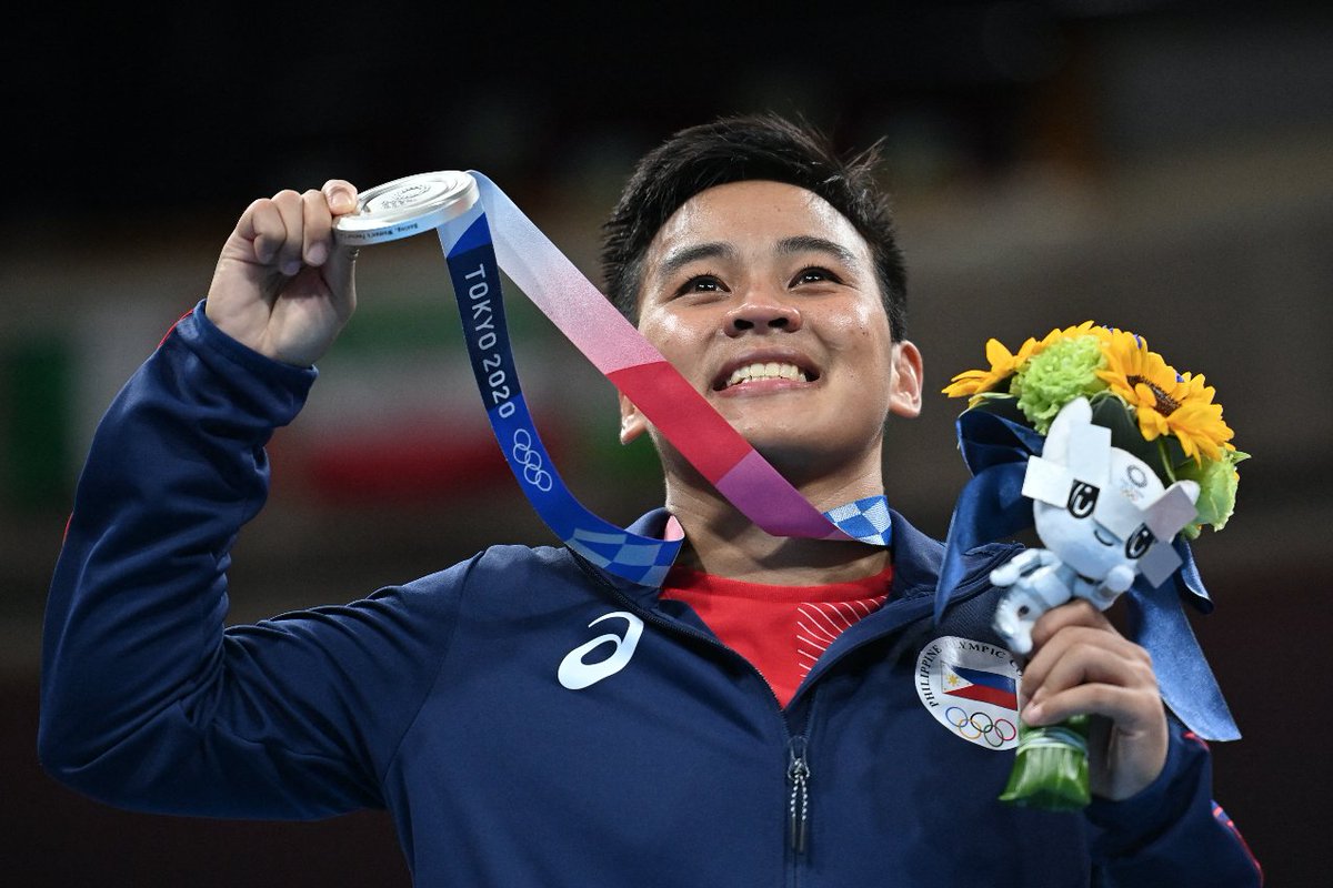 PhilippineStar's tweet photo. SALAMAT SA LABAN, NESTHY! 🥈

Silver medalist Nesthy Petecio made history as the first Filipina to win an Olympic medal in boxing! #Tokyo2020. (Wire photos) https://t.co/WsEpLG5Cul
