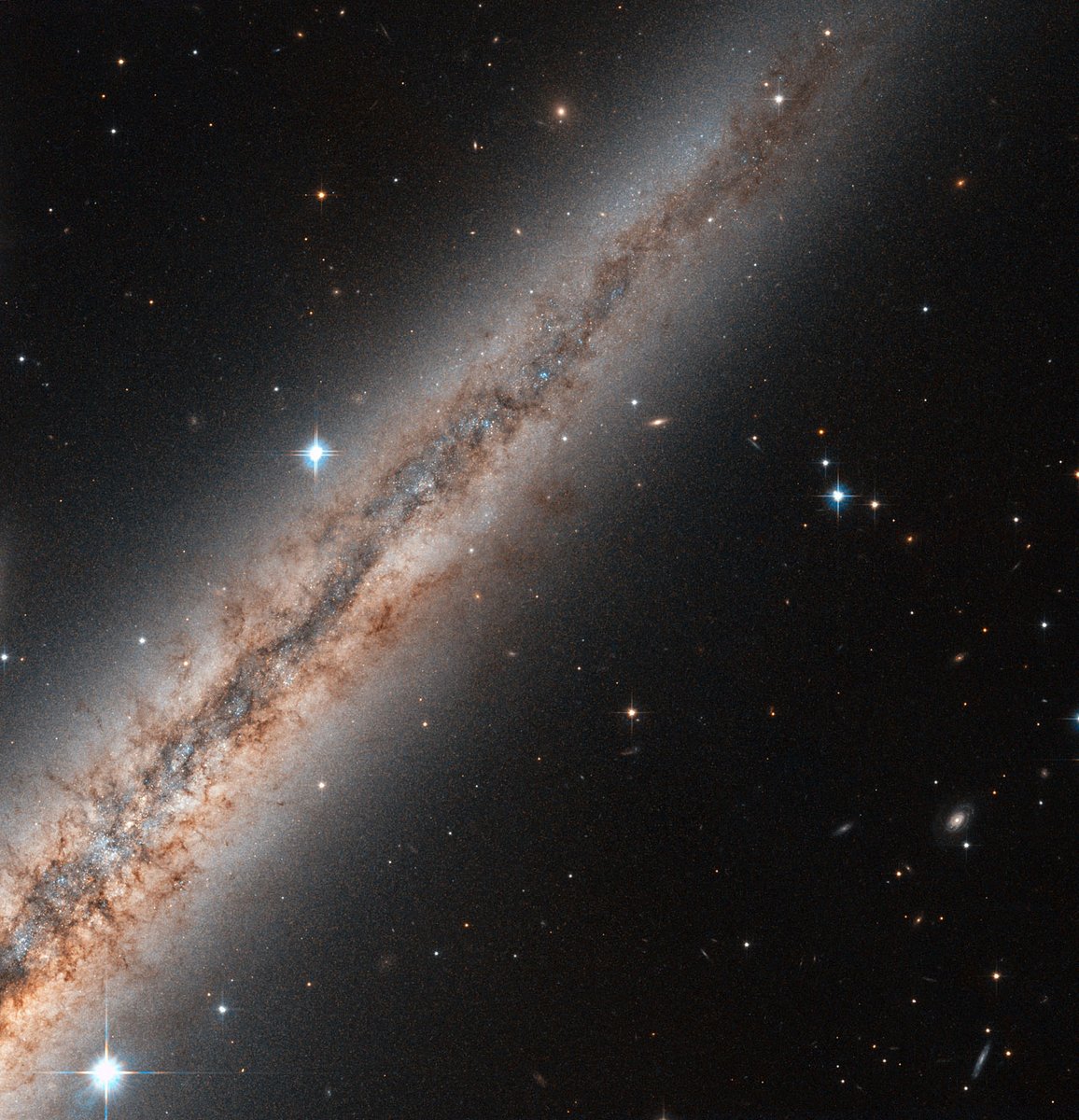 A Hubble image of a galaxy seen edge on. 