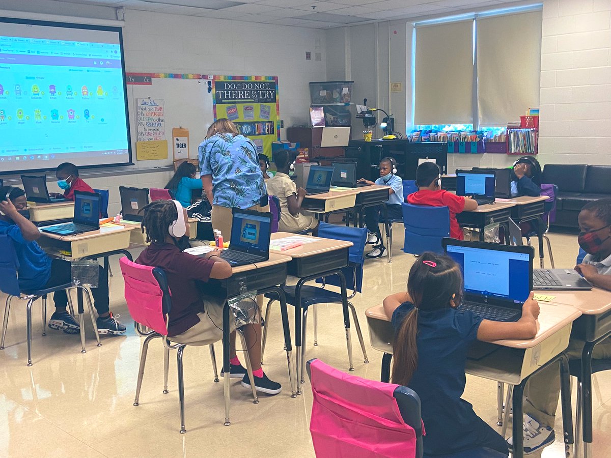 DrNHenderson's tweet image. It’s day 2 &amp;amp; @JamesRLowell51 students are logged on to @ImagineLearning  , learning about place value and presenting to their peers #StartStrongIPS