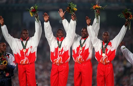 PTBCanada's tweet photo. 25 Years ago today, history was made as Canada won GOLD in Mens 4 x 100M relay:  Robert Esme, GlennRoy Gilbert, @BrunySurin and @donovanbailey. Relive the action – go to https://t.co/6CKpMJFXYU for all the feels.

❤️🥇🥇🥇🥇🇨🇦

 PC:  C. Andersen https://t.co/lk0m6SzxfB