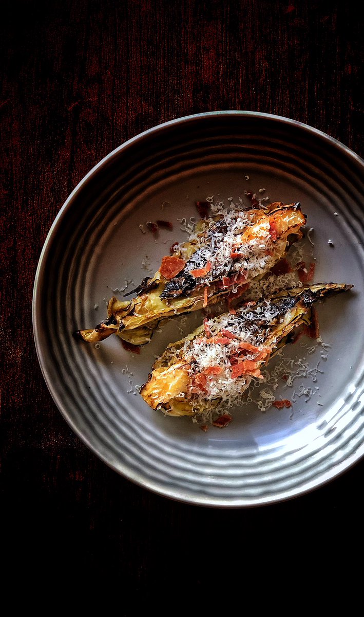 BBQ hispi, miso and anchovy butter, crisped bacon and smoked Parmesan