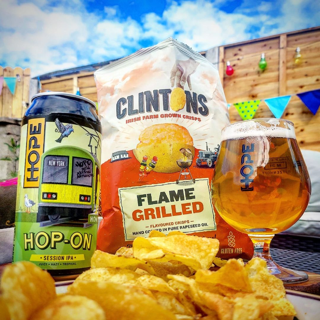 HopeBeerDublin's tweet photo. It’s not just our Summer Seasonal Hazy IPA that goes great with @Clintonscrisps Cheese &amp; Onion. Their range is the perfect accompaniment to ours, like Hop-On with their Flame Grilled. Tried and tested by @KateODsTruffles!
#FoodLovesHope https://t.co/tKPVCeHQfZ