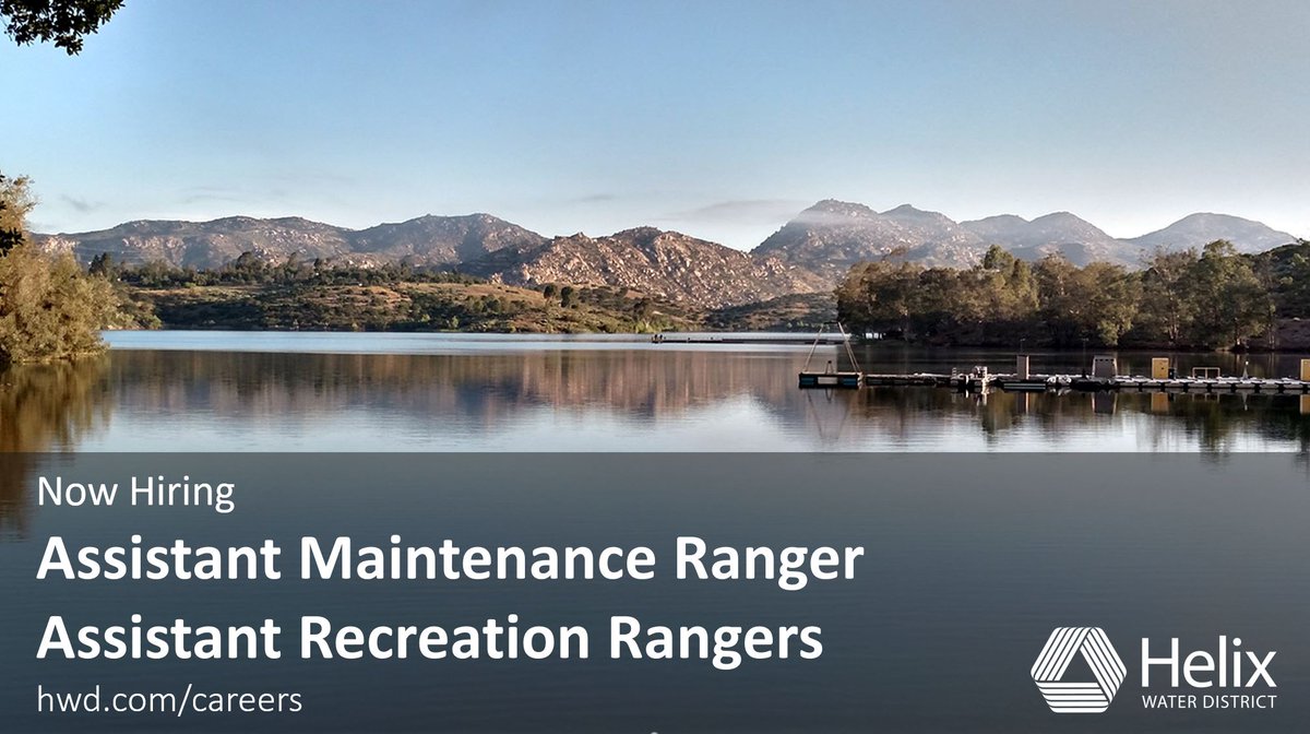 Calm water at Lake Jennings in Lakeside with mountains behind reflecting in lake.
