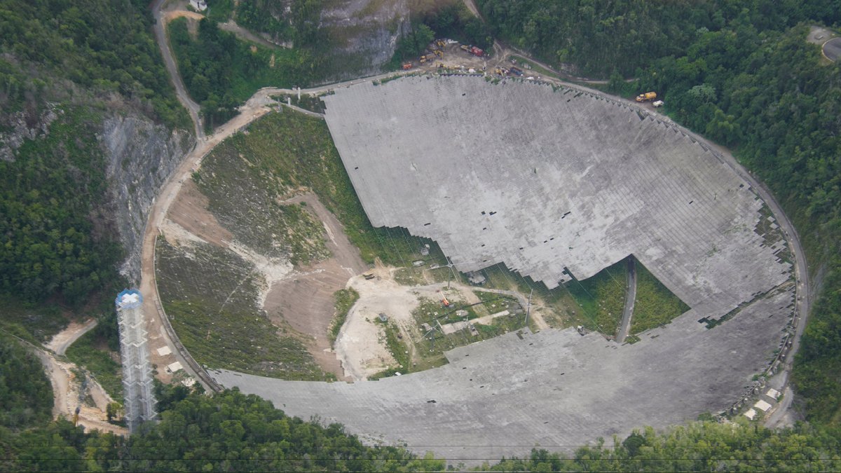 Aerial look at the current state of Arecibo Observatory.