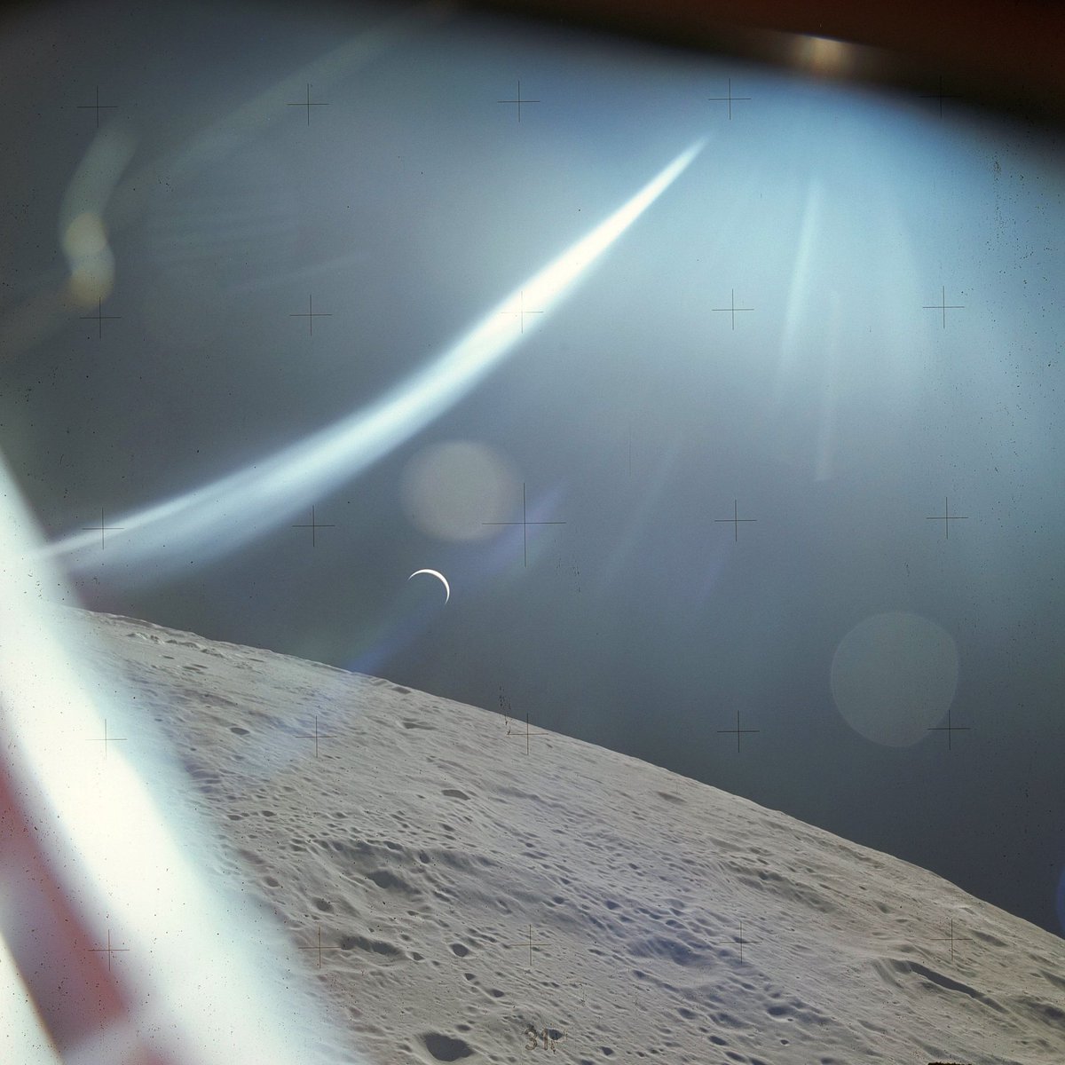 JPMajor's tweet photo. This is a (digital scan of a) 70mm film photograph showing a crescent Earth beyond the Moon, captured from the Apollo 15 CM Endeavour on August 4, 1971 (Image # AS15-88-11997) #OTD 🌒🌎 https://t.co/Mkz9kXIvNX