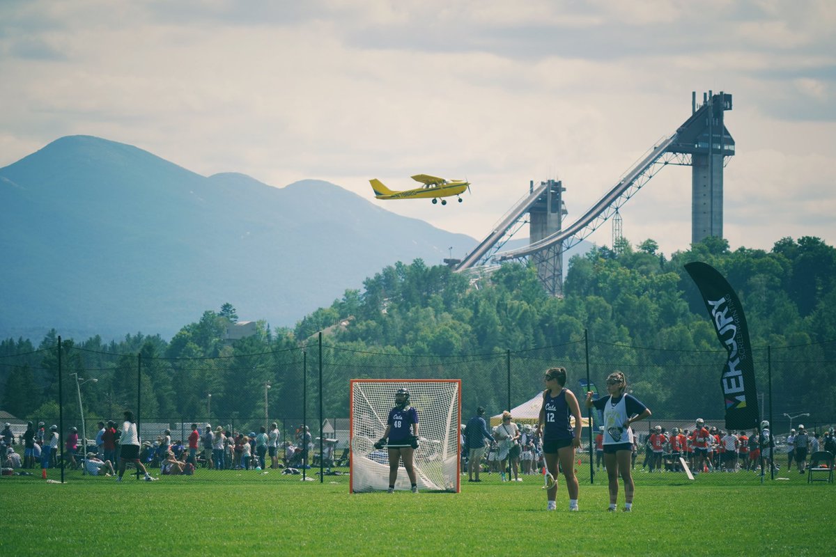 lakeplacidlax's tweet photo. Scenes from Day 2 at the Lake Placid Summit Classic, an action-packed dose of 🥍 up in the #ADKs. Today brings the scholastic championships across 9 competitive divisions. Use #LaxPlacid and track scores via #TourneyMachine all week long. #LaxPlacid #LakePlacidLax (📸: @cvock) https://t.co/3MdAFxcKBi