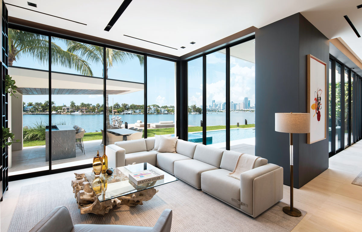 #WaterViewWednesday - #dunagandiverio - Dunagan Diverio Design Group blends the indoors with the outdoors in this chic open plan which embodies the ideal combination of modern architectural simplicity and unobstructed Miami skyline views. See more at floridadesign.com