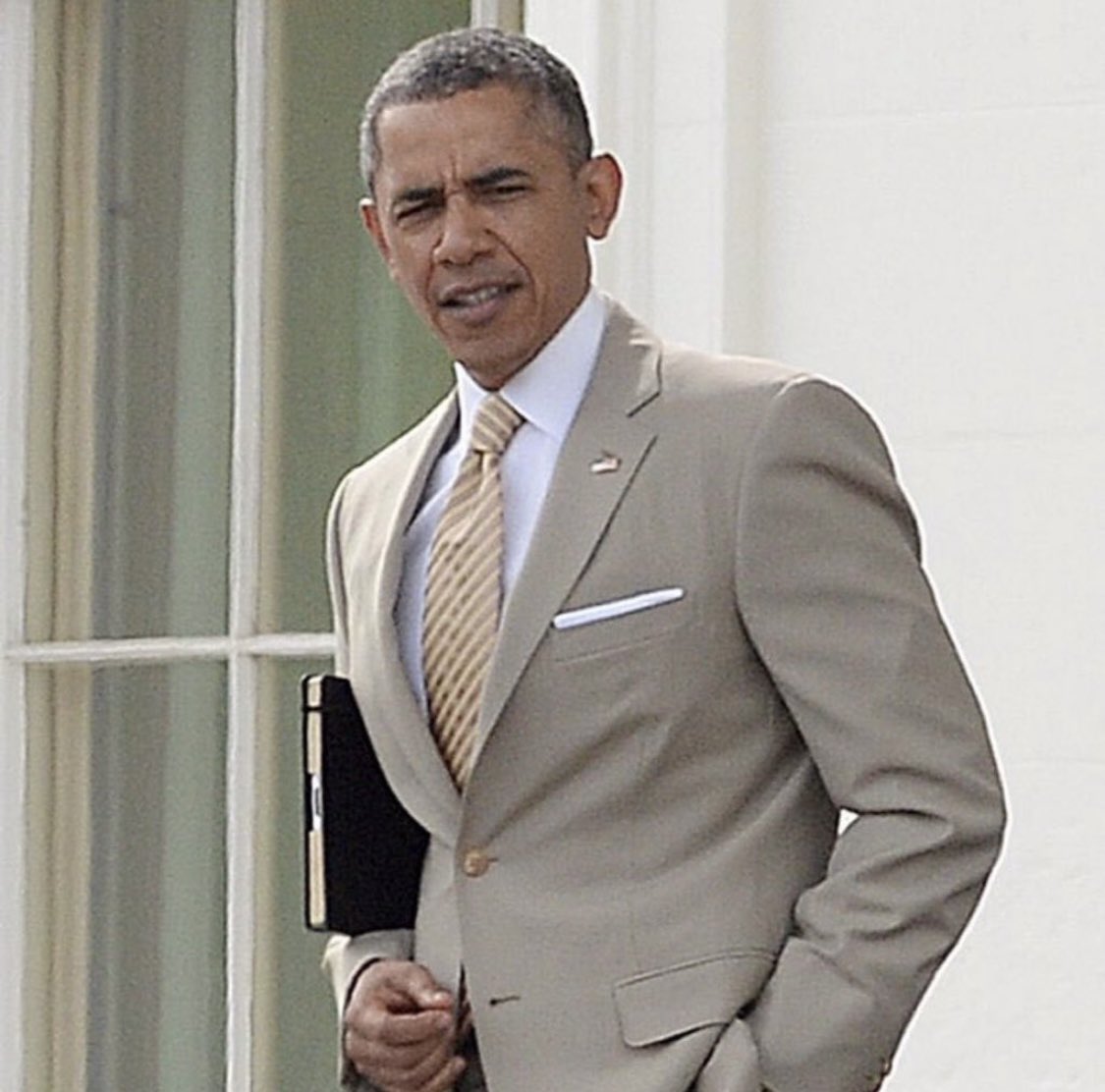 novelidea14's tweet photo. Happy 60th birthday to a former President, who’s biggest scandal was wearing a tan suit. #HappyBirthdayObama 💜 https://t.co/8RNLVbPHAV